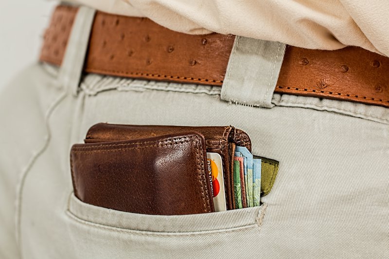 Bulging wallet sticking out of back pocket perfect for pickpockets
